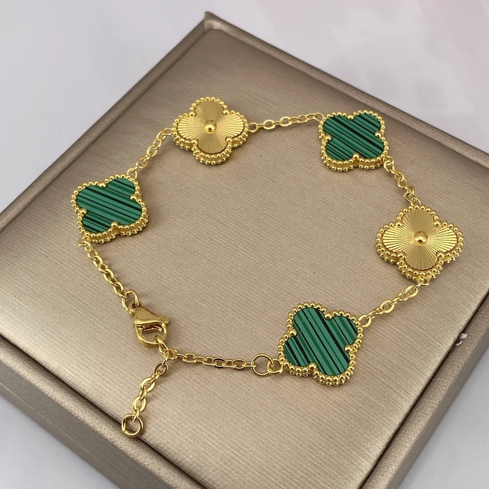 Elegant Gold and Green Clover Bracelet